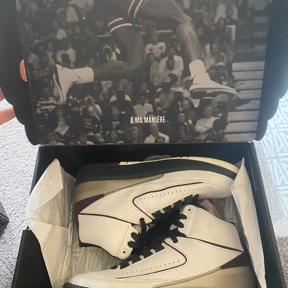 Jordan White and Black High-Top Sneakers